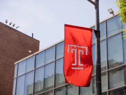 Temple University flag banner on Broad Street in Philadelphia